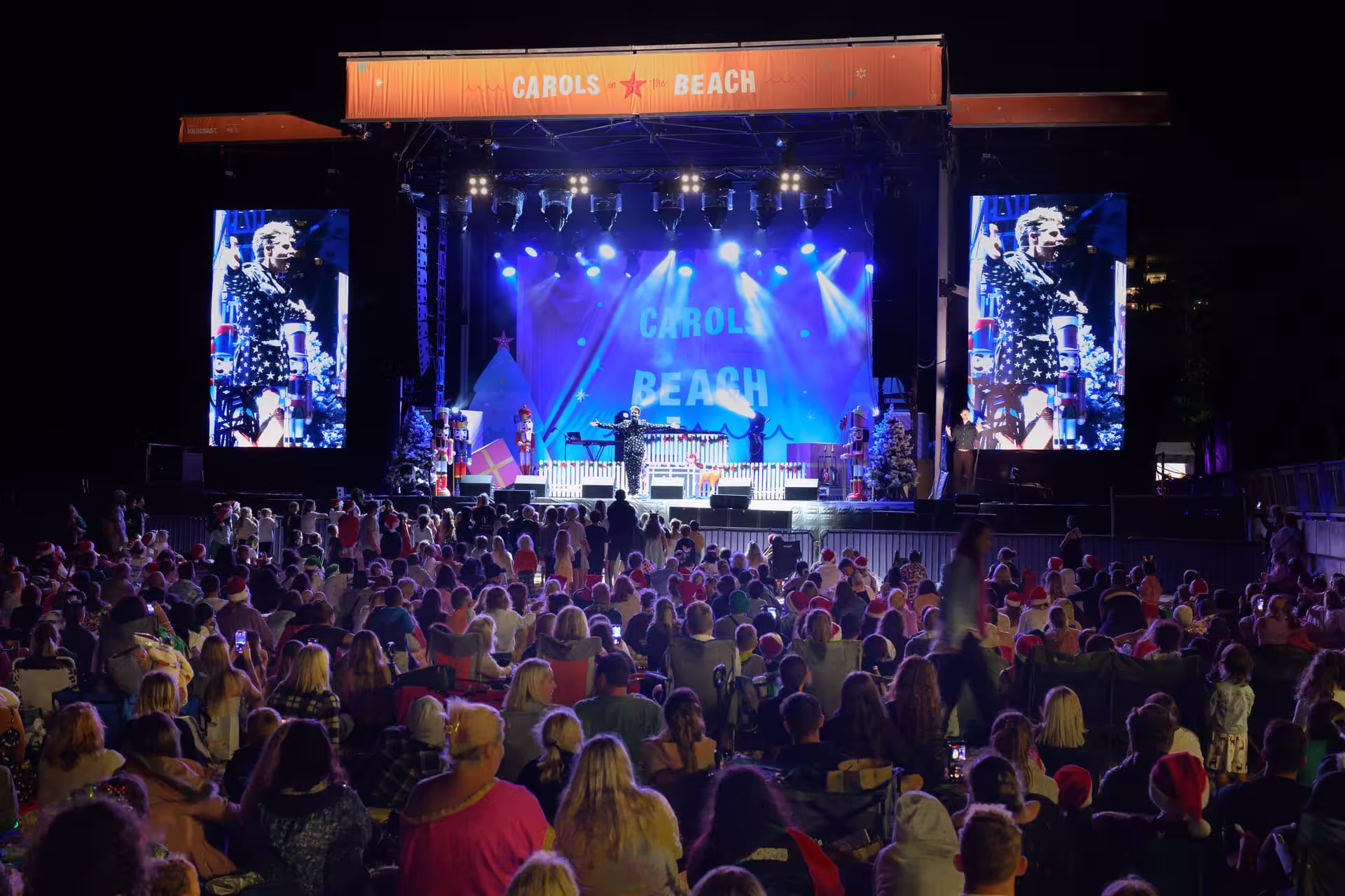 Jason Gray performing for a live event audience